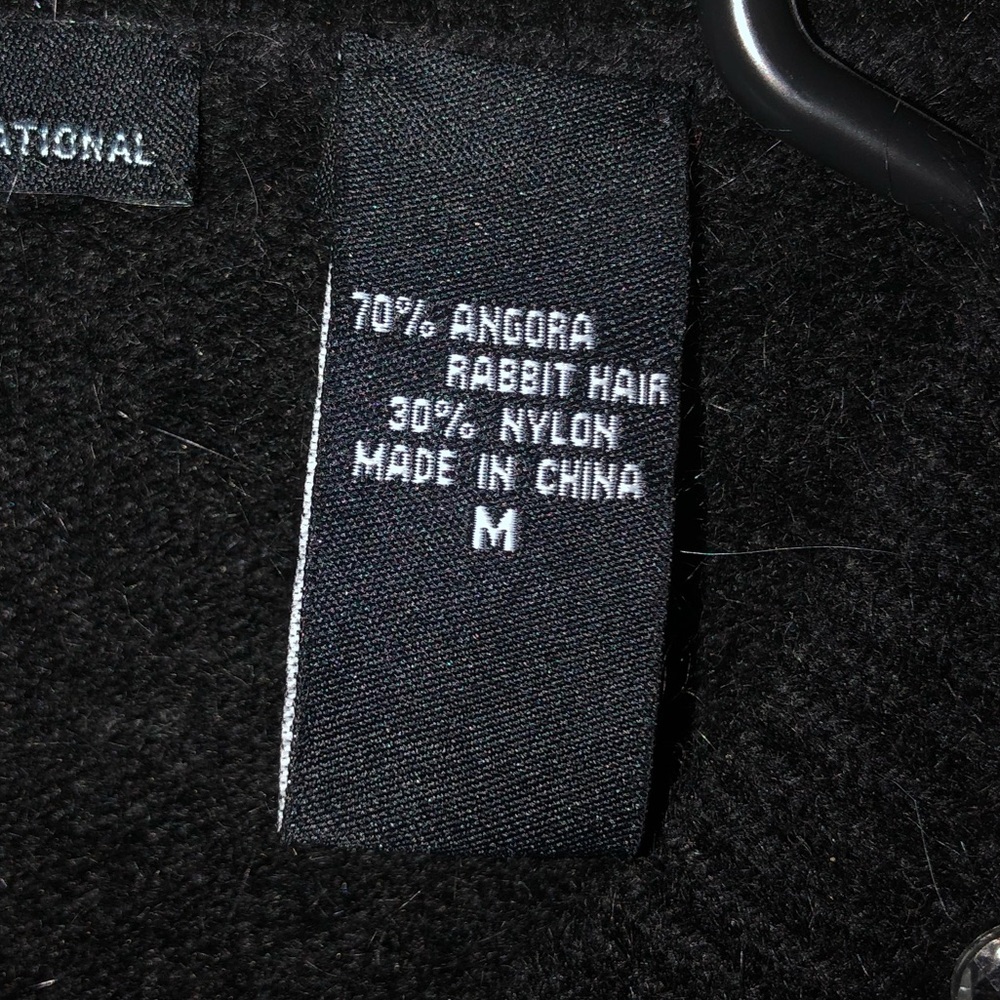 Black Angora rabbit hair cardigan.